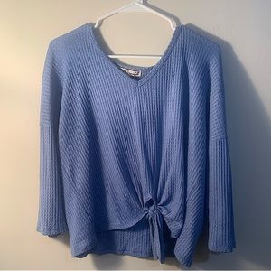 Gypsies, never worn, baby blue cloth sweater, long sleeves, tied knot on bottom